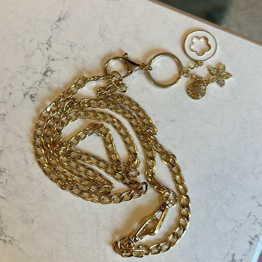 Unbranded gold tone crossbody chain with charms